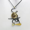 Vote necklace with 22k gold and oxidized silver. 2020 vote