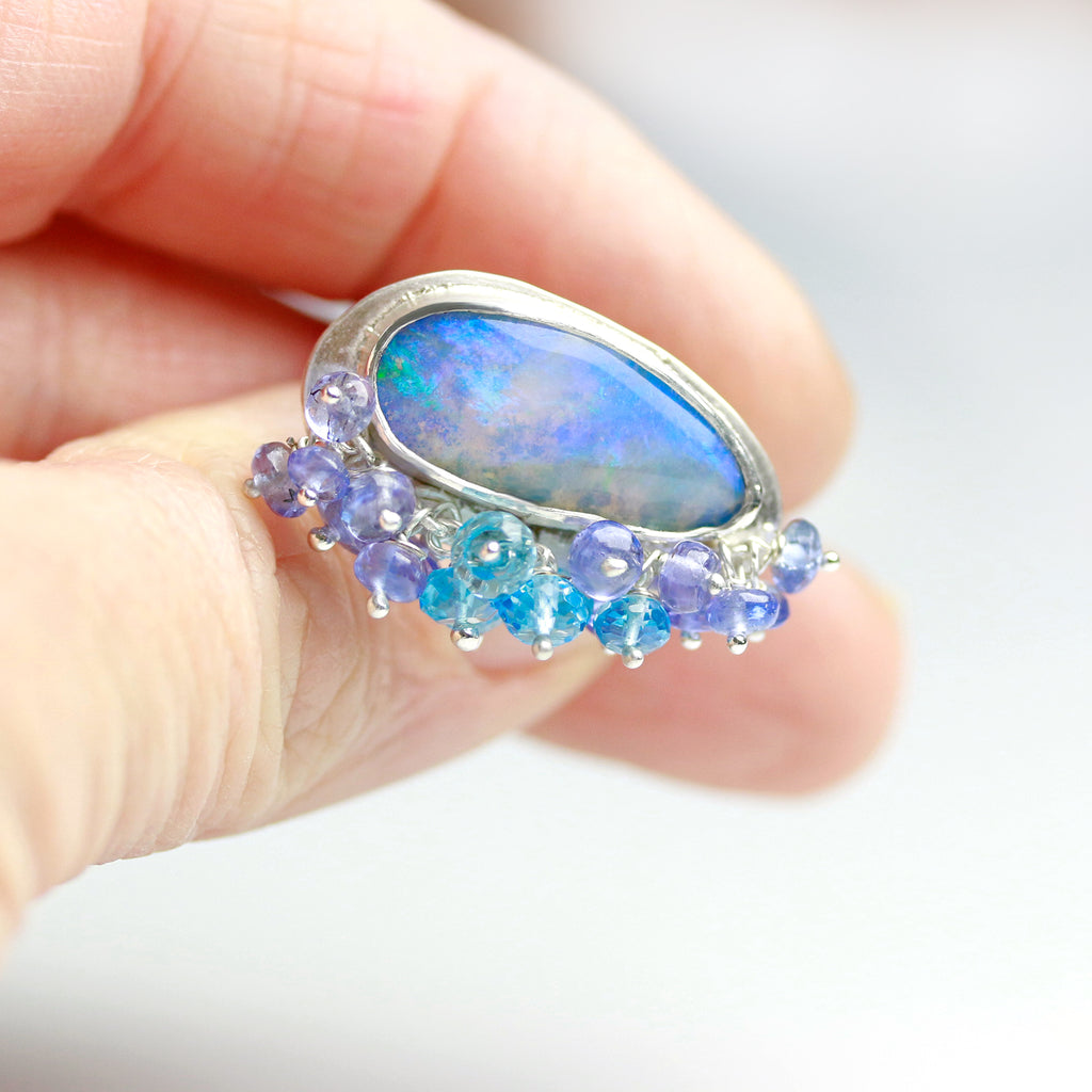 Lilac and Bright Aqua Flash Boulder Opal Ring with Tanzanite and Blue Topaz Fringe. Size 6 3/4. - Wendy Stauffer of Fuss Jewelry